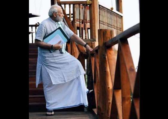 മോടികൂട്ടി  മോദിയുടെ  പുതിയ ലുക്ക്